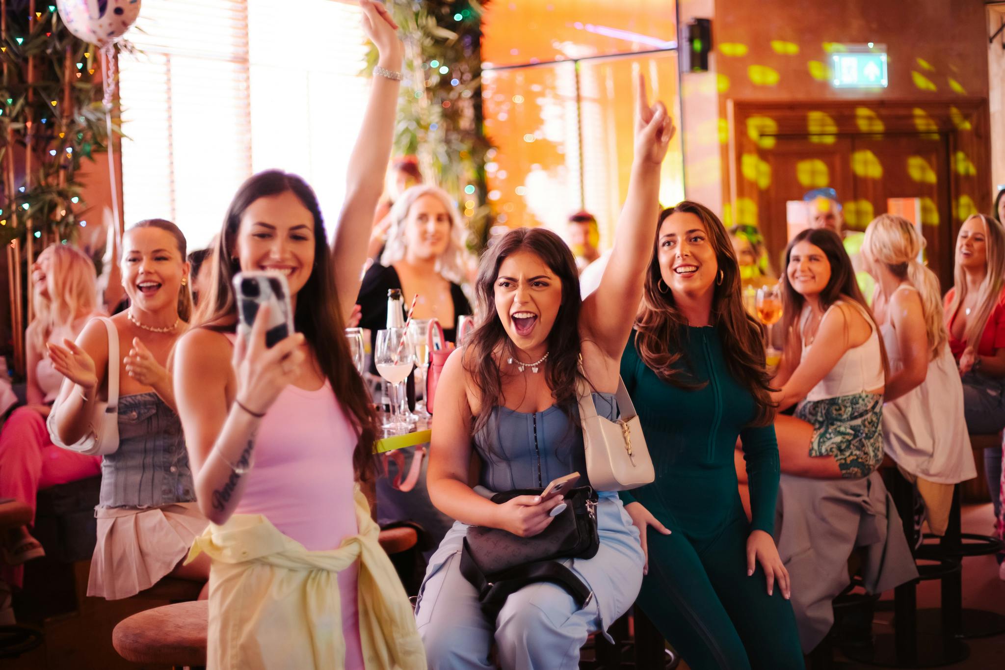 Women enjoying a bottomless brunch at Nikki's Bar in Shoreditch